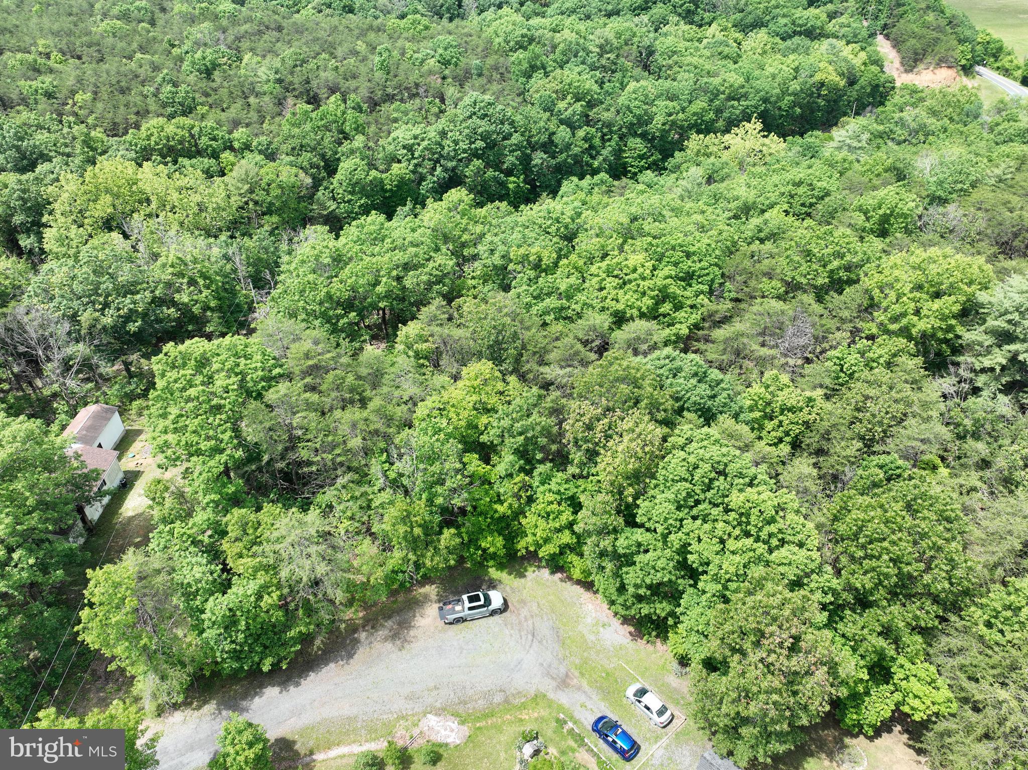 2.23-ac Doe Trail Springfield, WV 26763 - Photo 17 of 19 an aerial view of a house with a yard