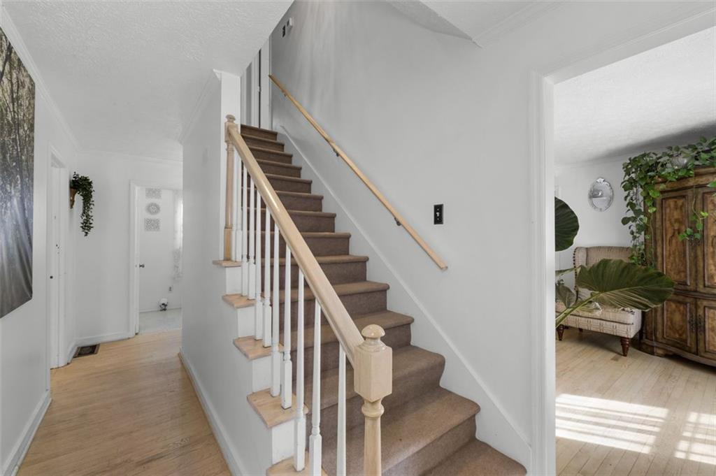 58 Cedar Bluff Winder, GA 30680 - Photo 12 of 39 a view of hallway with livingroom and stairs