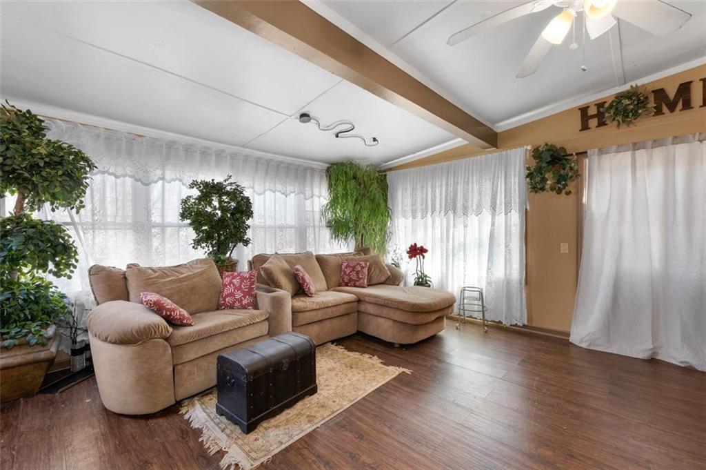 58 Cedar Bluff Winder, GA 30680 - Photo 18 of 39 a living room with furniture and a large window