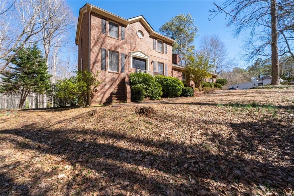 58 Cedar Bluff Winder, GA 30680 - Photo 20 of 39 a front view of a house with a yard