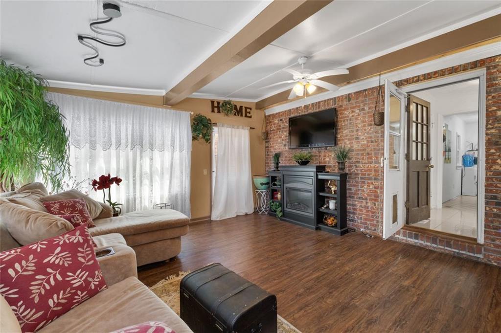58 Cedar Bluff Winder, GA 30680 - Photo 33 of 39 a living room with furniture and a flat screen tv