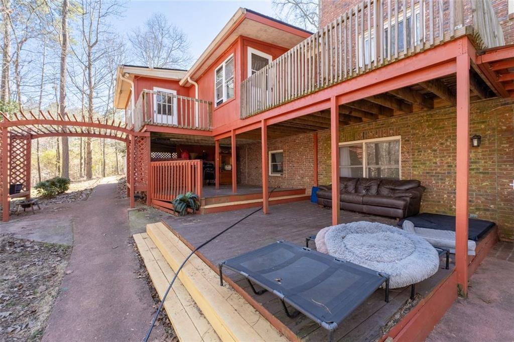 58 Cedar Bluff Winder, GA 30680 - Photo 35 of 39 a view of a chairs and table in the patio