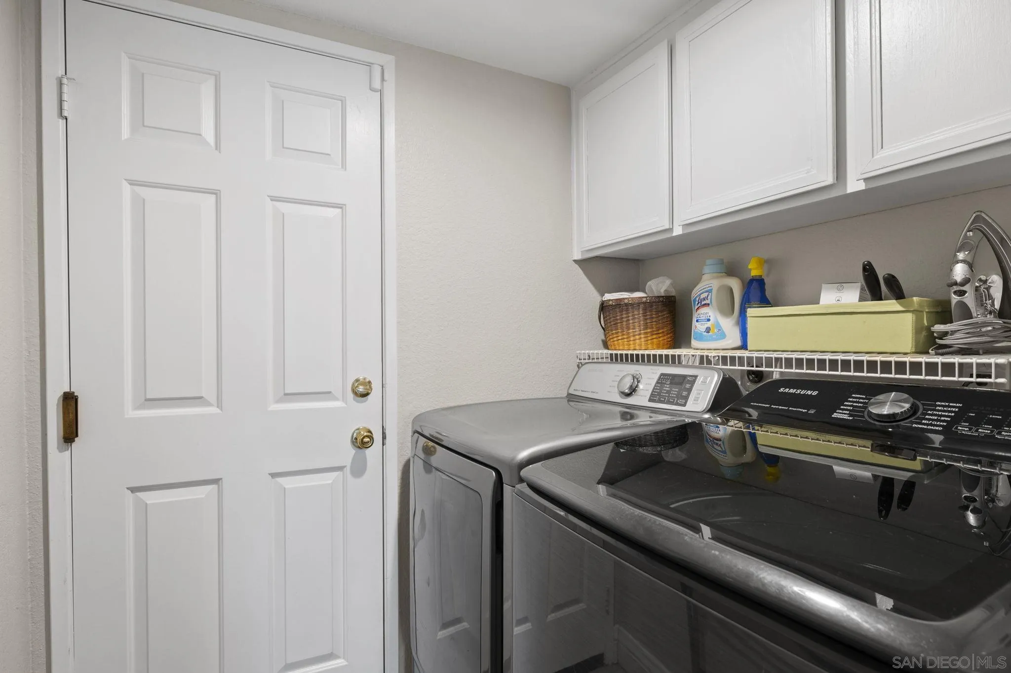 13972 Poway Valley Road Poway, CA 92064 - Photo 19 of 59 a kitchen with stainless steel appliances granite countertop a sink a stove and cabinets