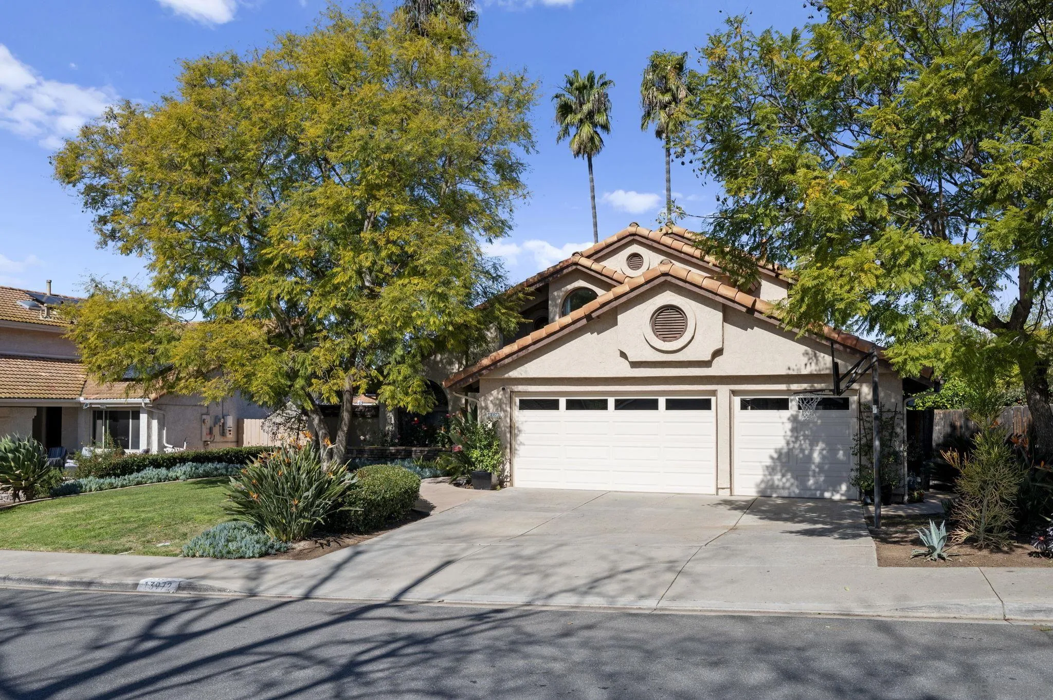13972 Poway Valley Road Poway, CA 92064 - Photo 2 of 59 a front view of a house with a yard and garage
