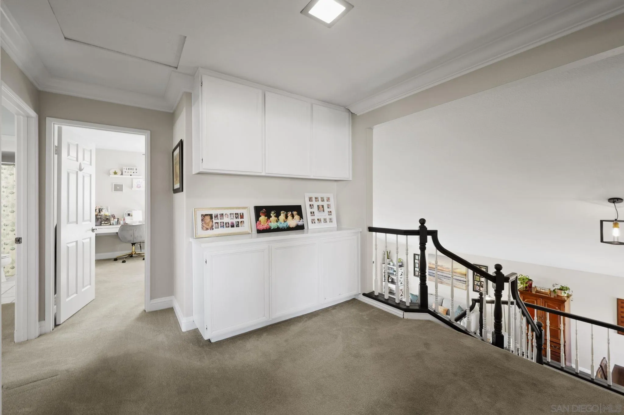 13972 Poway Valley Road Poway, CA 92064 - Photo 21 of 59 a view of a hallway to a livingroom with a furniture
