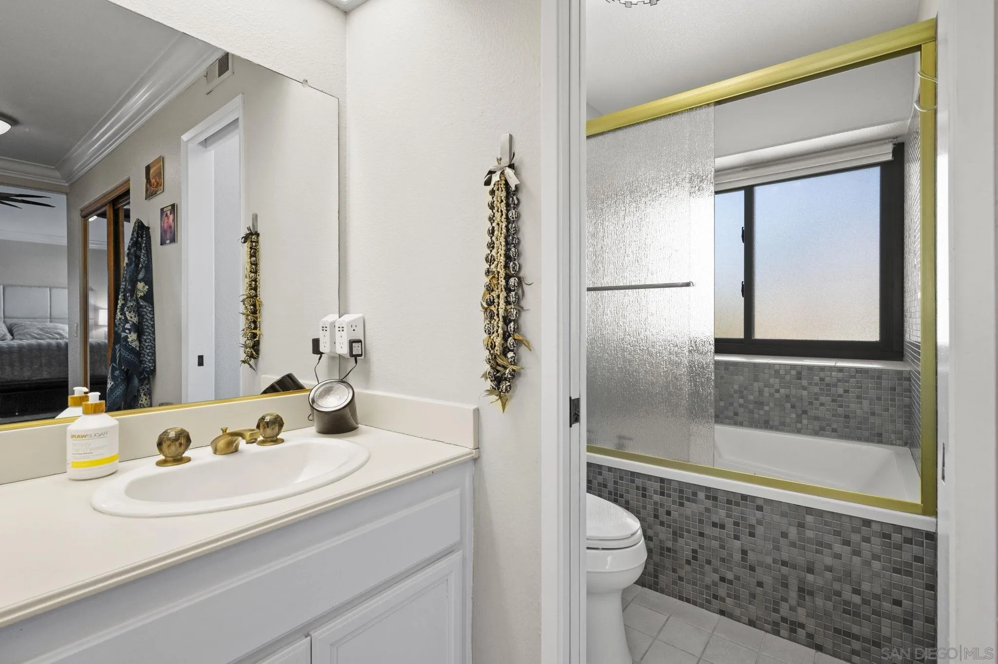 13972 Poway Valley Road Poway, CA 92064 - Photo 26 of 59 a bathroom with a granite countertop sink and a mirror