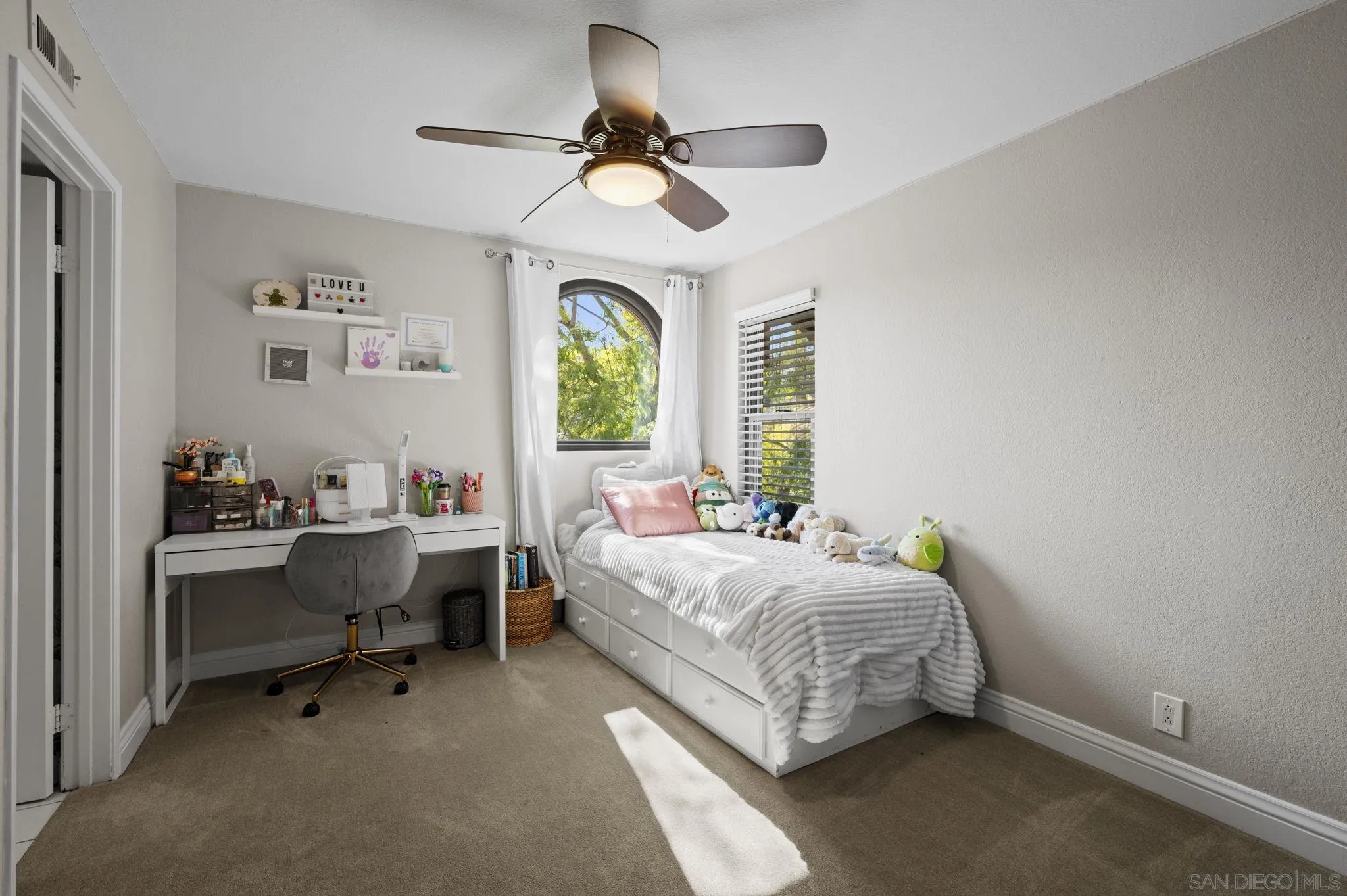 13972 Poway Valley Road Poway, CA 92064 - Photo 29 of 59 a bedroom with a bed and a desk