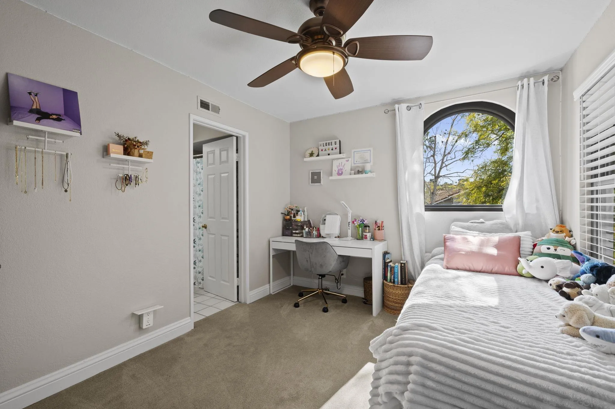 13972 Poway Valley Road Poway, CA 92064 - Photo 30 of 59 a bedroom with a bed furniture and a window