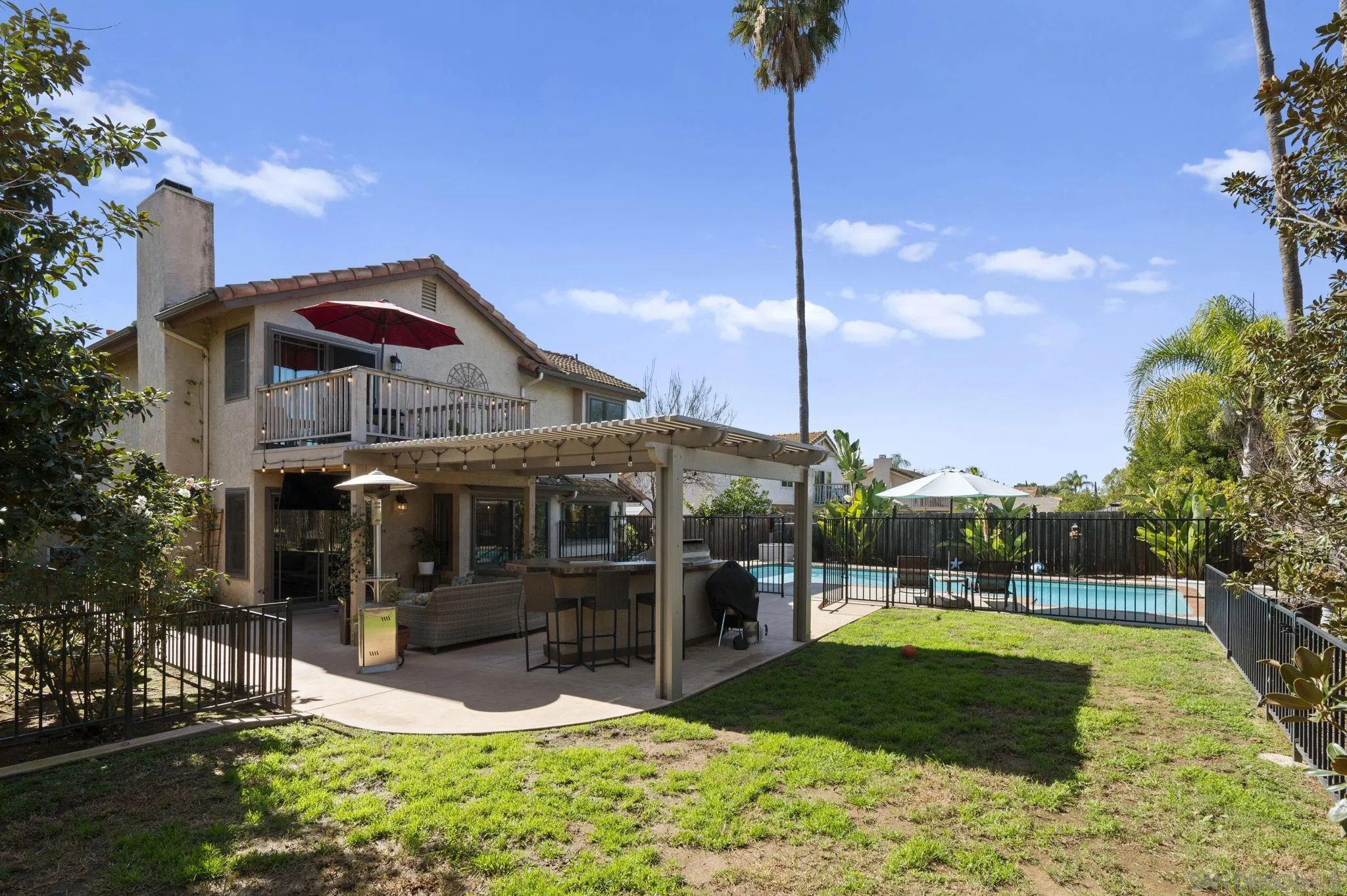 13972 Poway Valley Road Poway, CA 92064 - Photo 38 of 59 a view of a house with a swimming pool