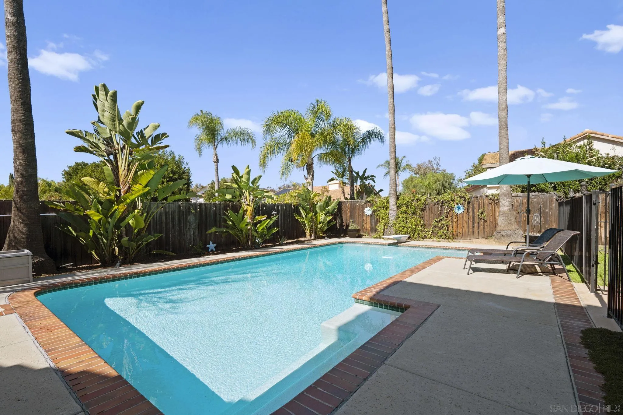 13972 Poway Valley Road Poway, CA 92064 - Photo 41 of 59 a view of a patio with chairs and table with chairs