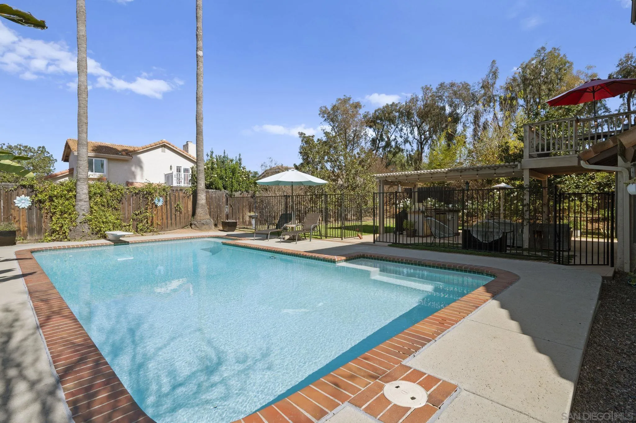 13972 Poway Valley Road Poway, CA 92064 - Photo 42 of 59 a view of a house with a swimming pool