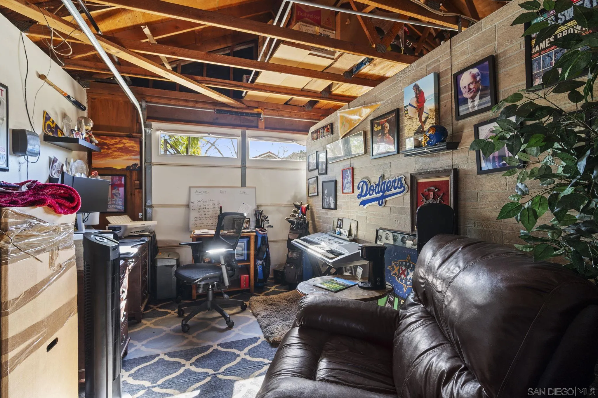 13972 Poway Valley Road Poway, CA 92064 - Photo 44 of 59 a living room with furniture and a potted plant