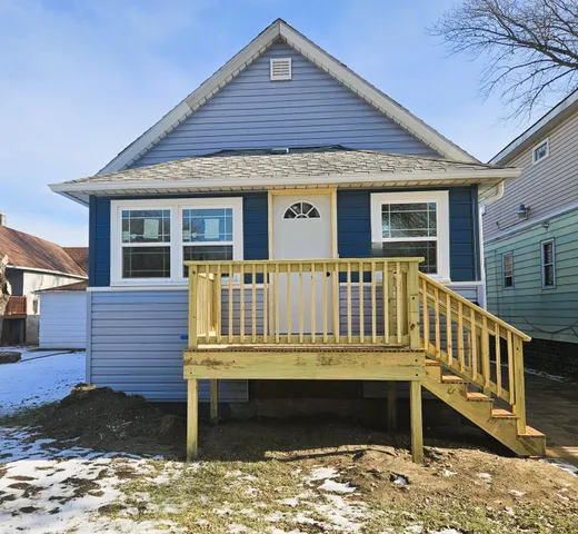a front view of a house with a balcony