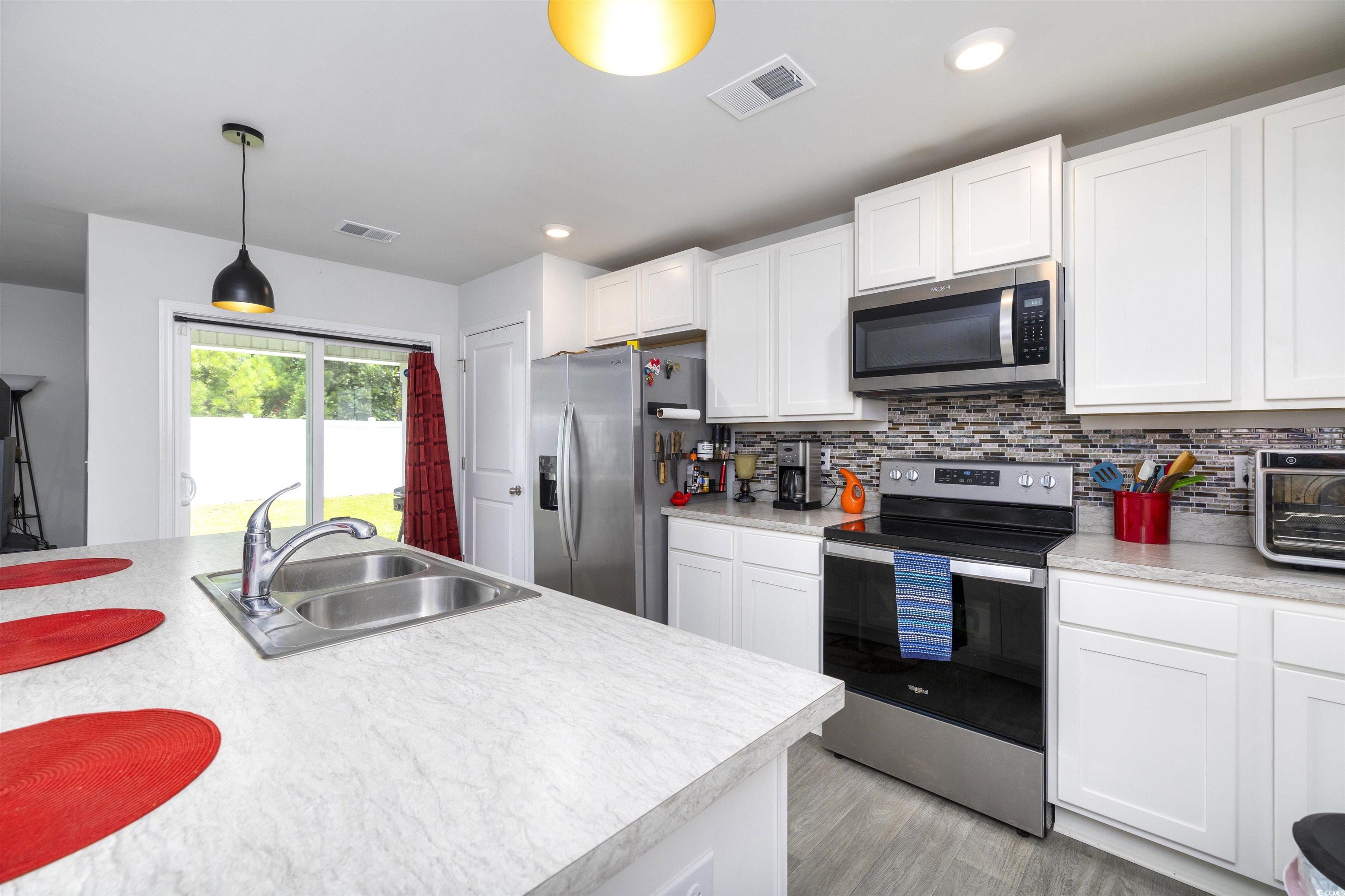 820 Twickenham Loop Longs, SC 29568 - Photo 14 of 38 Kitchen featuring tasteful backsplash, stainless s