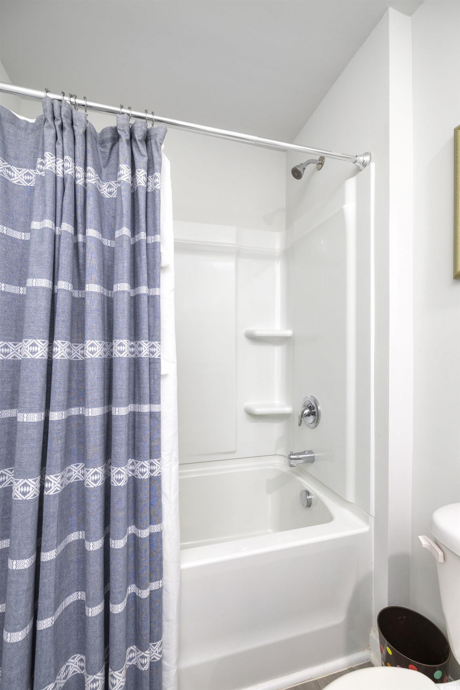 820 Twickenham Loop Longs, SC 29568 - Photo 28 of 38 Bathroom with shower / bath combo with shower curt