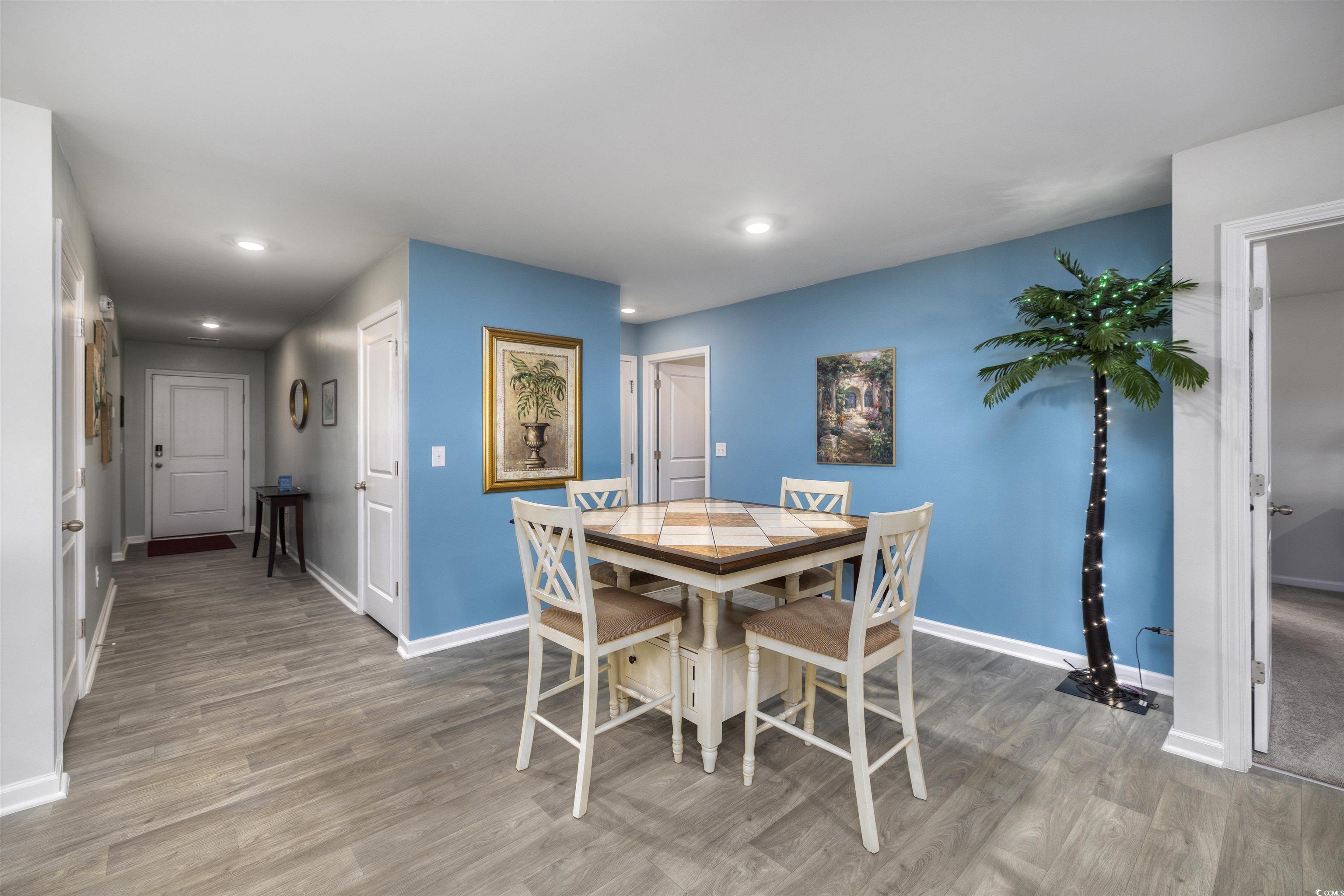 820 Twickenham Loop Longs, SC 29568 - Photo 5 of 38 Dining area with hardwood / wood-style floors