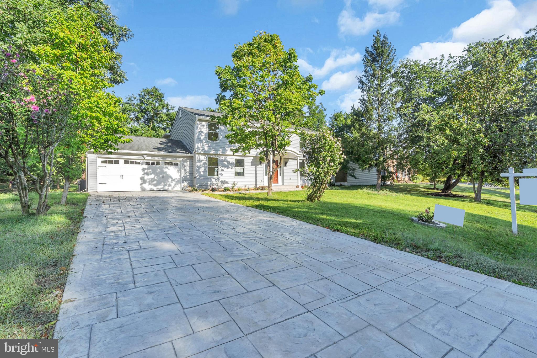 2296 Archdale Road Reston, VA 20191 - Photo 2 of 55 Stamp concrete driveway and patio (2022)