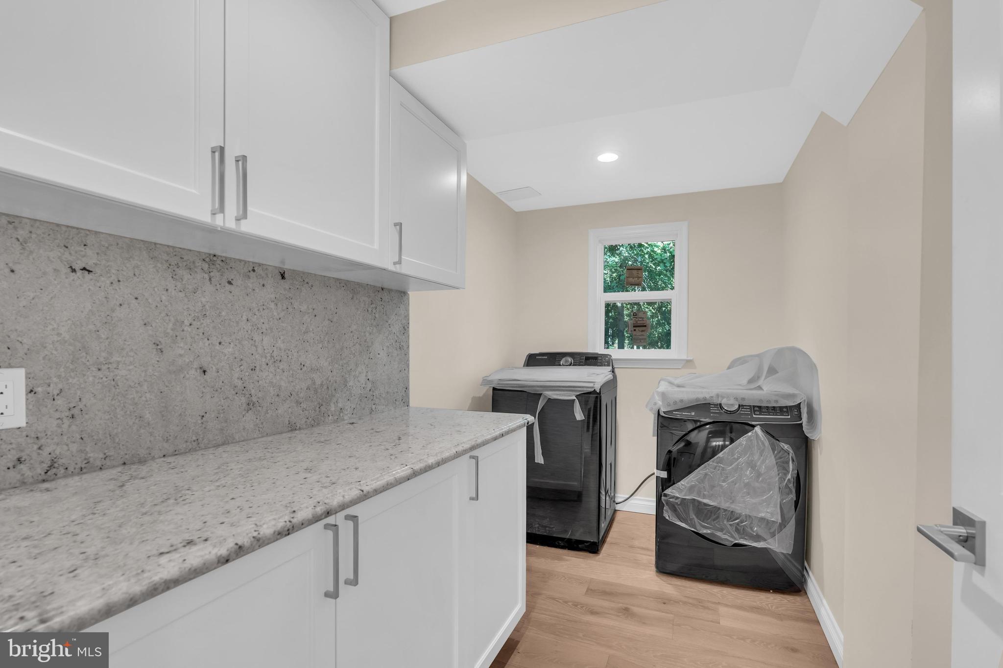 2296 Archdale Road Reston, VA 20191 - Photo 25 of 55 Samsung Washer and Dryer (2022. Main Level)