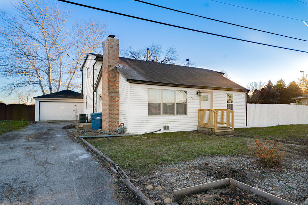 4841 West 119th Street Alsip, IL 60803 - Photo 26 of 33 a view of a house with a yard