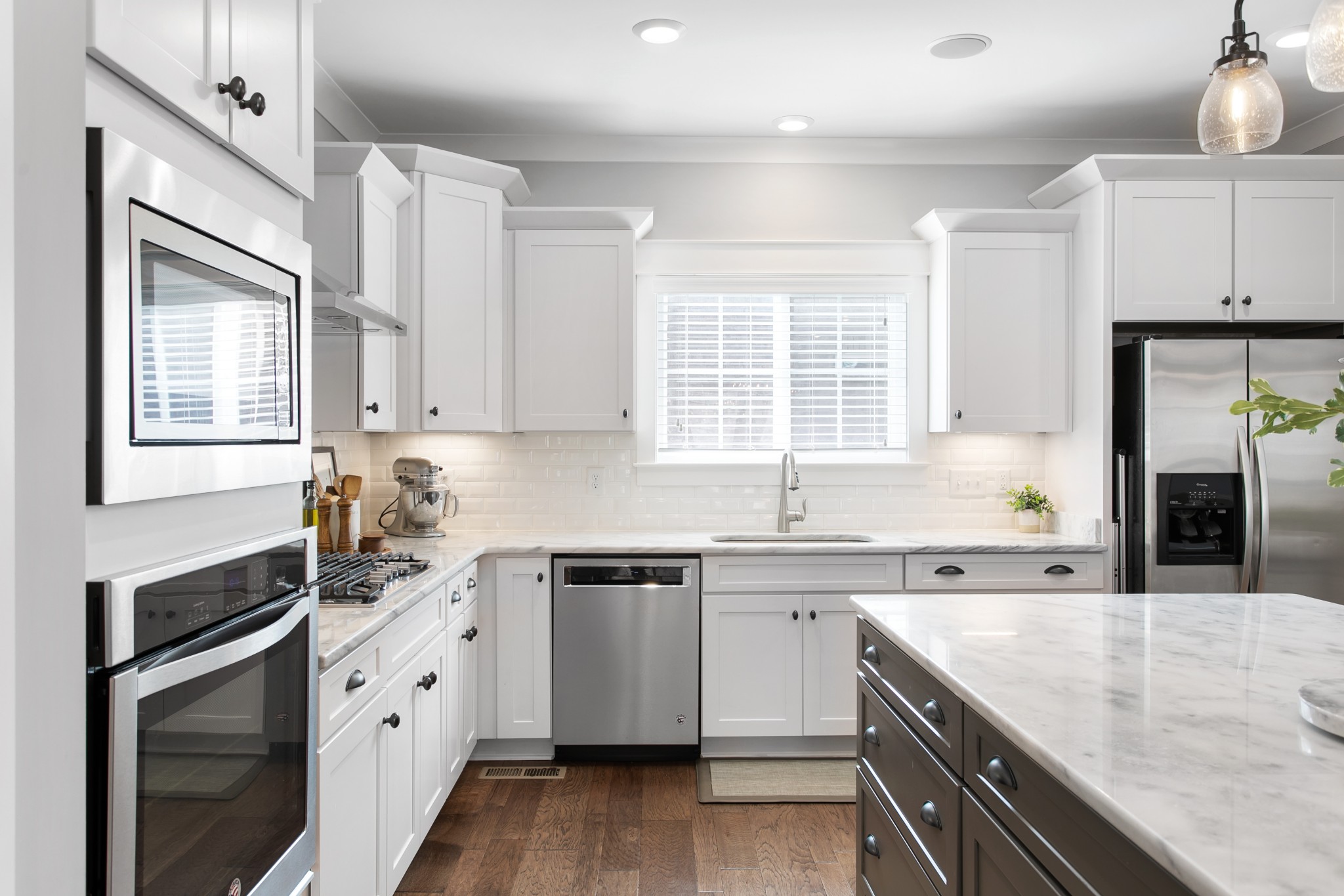 700 Beamon Drive Franklin, TN 37064 - Photo 11 of 47 a kitchen with granite countertop a sink stainless steel appliances and cabinets