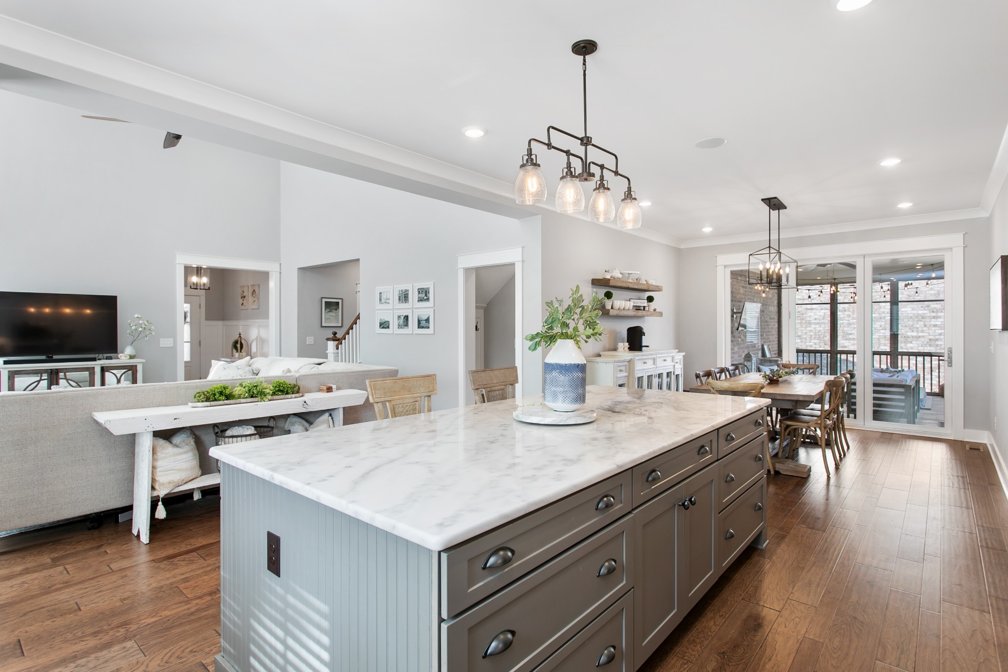 700 Beamon Drive Franklin, TN 37064 - Photo 13 of 47 a kitchen with a counter space a sink and living room view