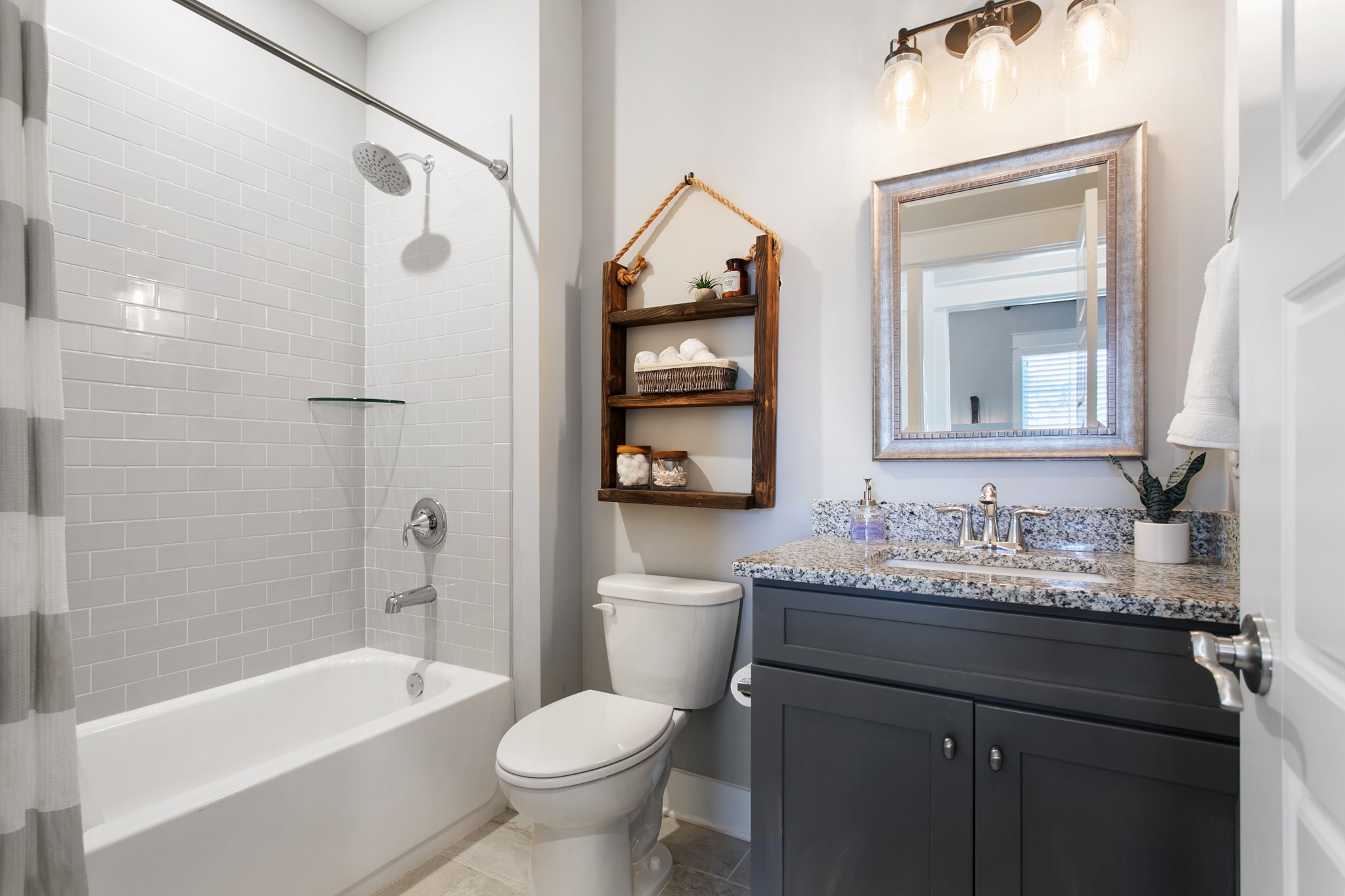 700 Beamon Drive Franklin, TN 37064 - Photo 30 of 47 a bathroom with a granite countertop sink toilet and shower