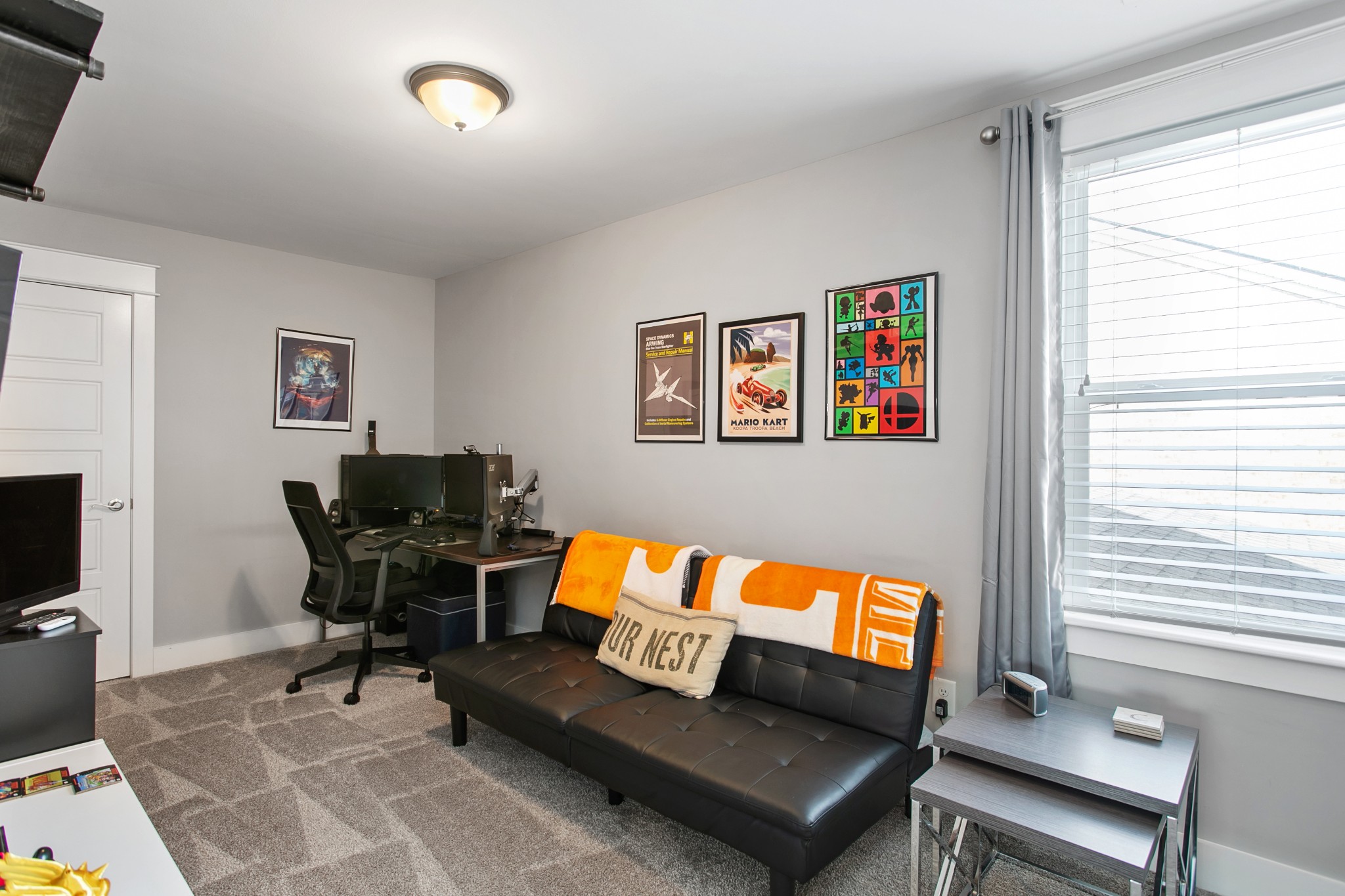 700 Beamon Drive Franklin, TN 37064 - Photo 36 of 47 a living room with furniture and a flat screen tv