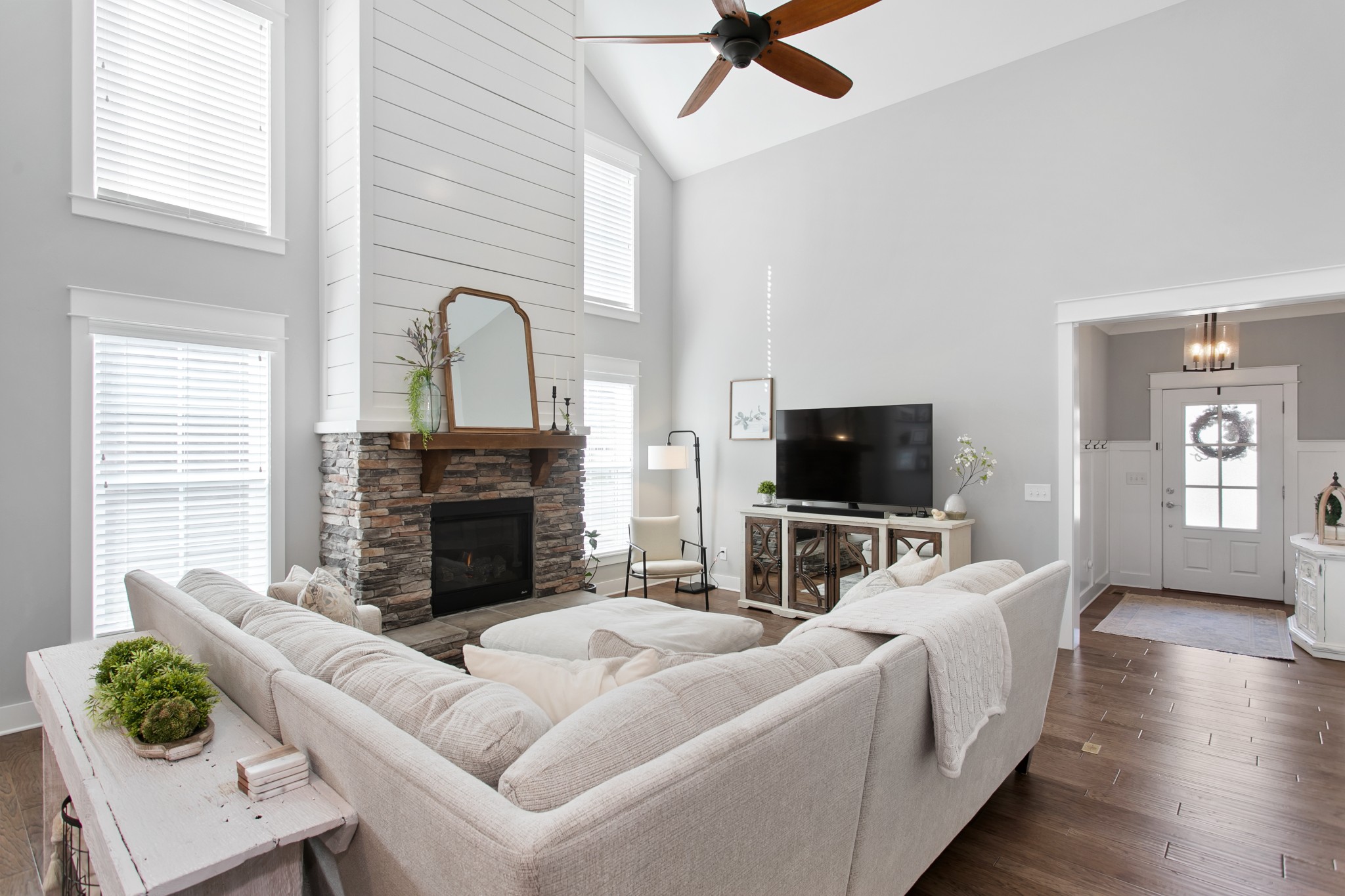700 Beamon Drive Franklin, TN 37064 - Photo 7 of 47 a living room with furniture and a flat screen tv
