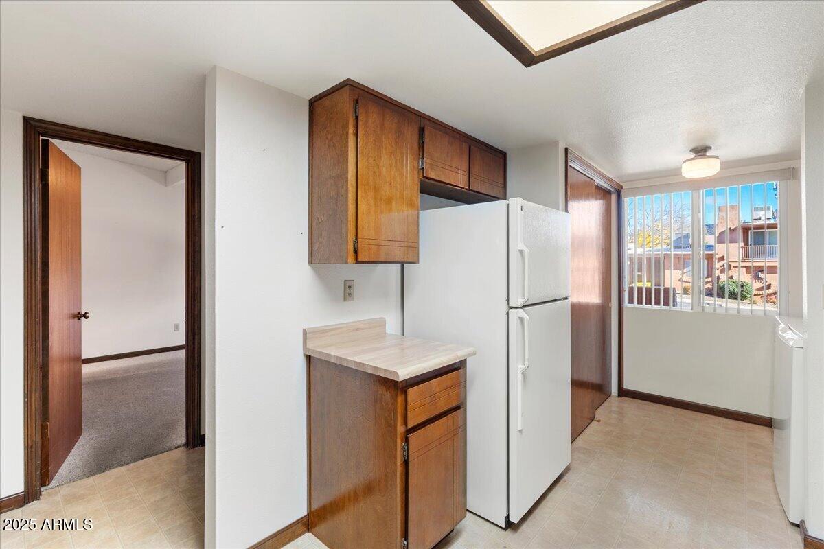 130 Castle Rock Road, Unit 83 Sedona, AZ 86351 - Photo 13 of 32 a kitchen with stainless steel appliances a refrigerator and a sink