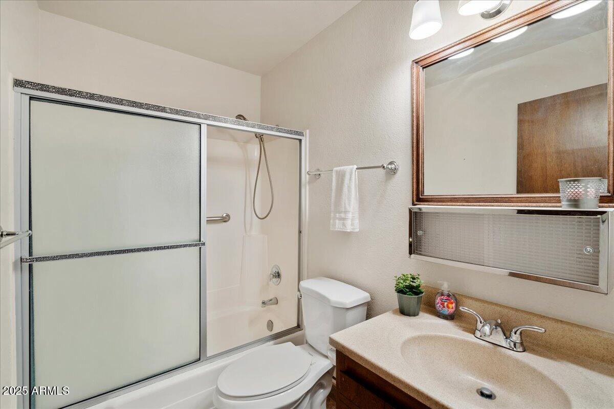 130 Castle Rock Road, Unit 83 Sedona, AZ 86351 - Photo 22 of 32 a bathroom with a sink toilet and shower