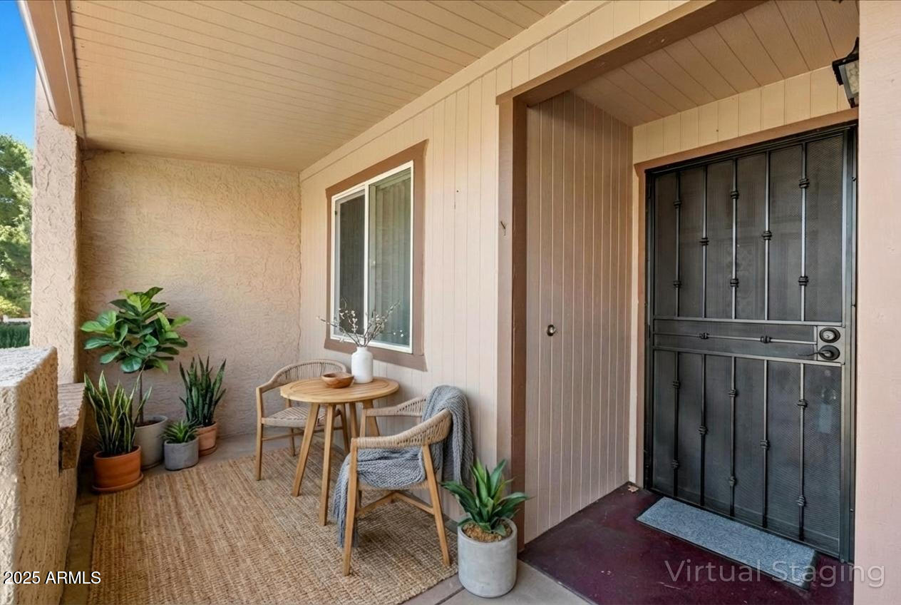 130 Castle Rock Road, Unit 83 Sedona, AZ 86351 - Photo 8 of 32 a patio with table and chairs potted plants