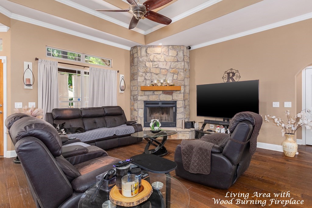 1171 Old Ewing Road Lufkin, TX 75901 - Photo 10 of 49 a living room with fireplace furniture and a flat screen tv