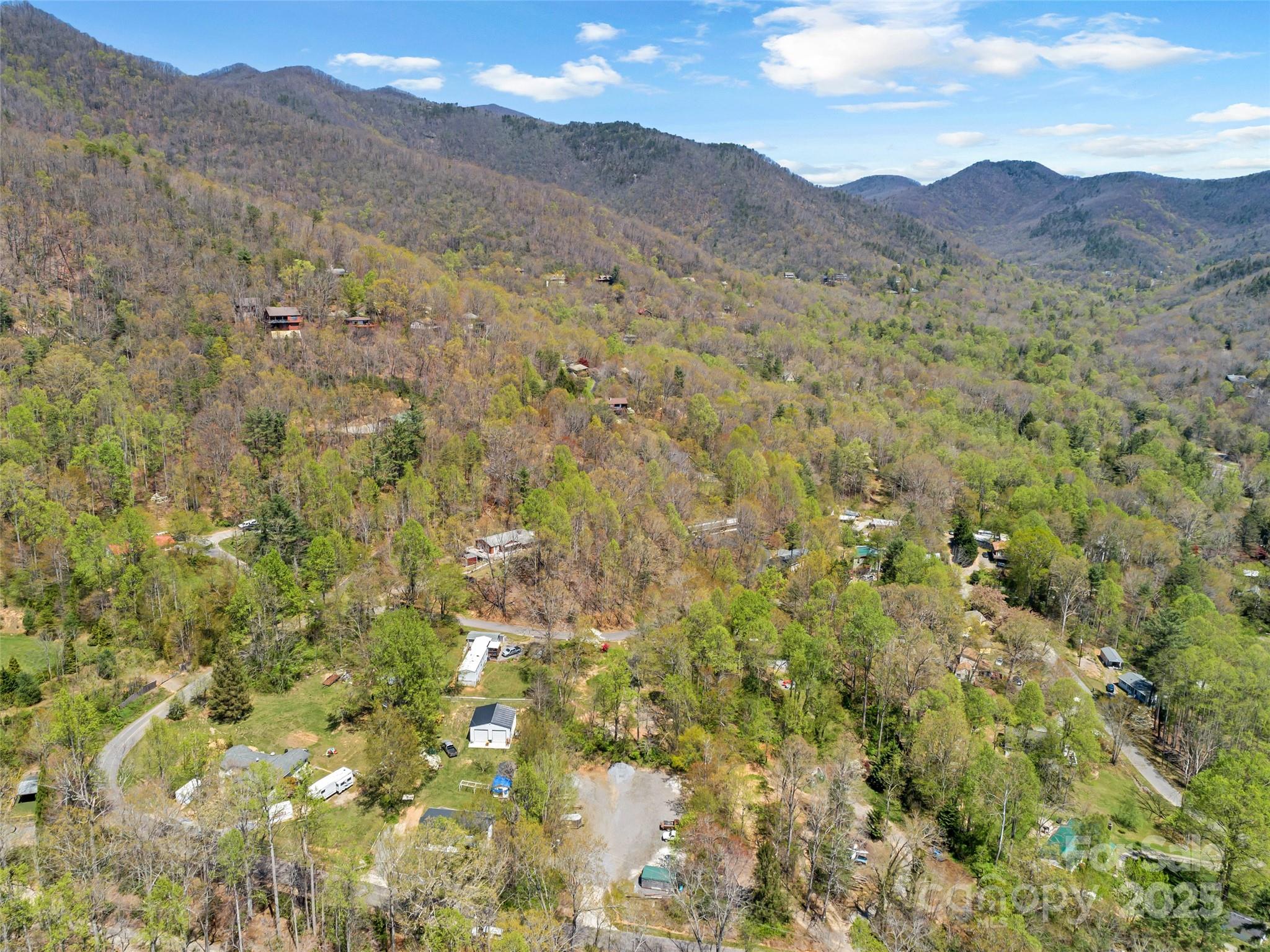 Tbd Carolina Heights, Unit TRACTS B C & D Black Mountain, NC 28711 - Photo 12 of 14 a view of a lush green hillside and a building