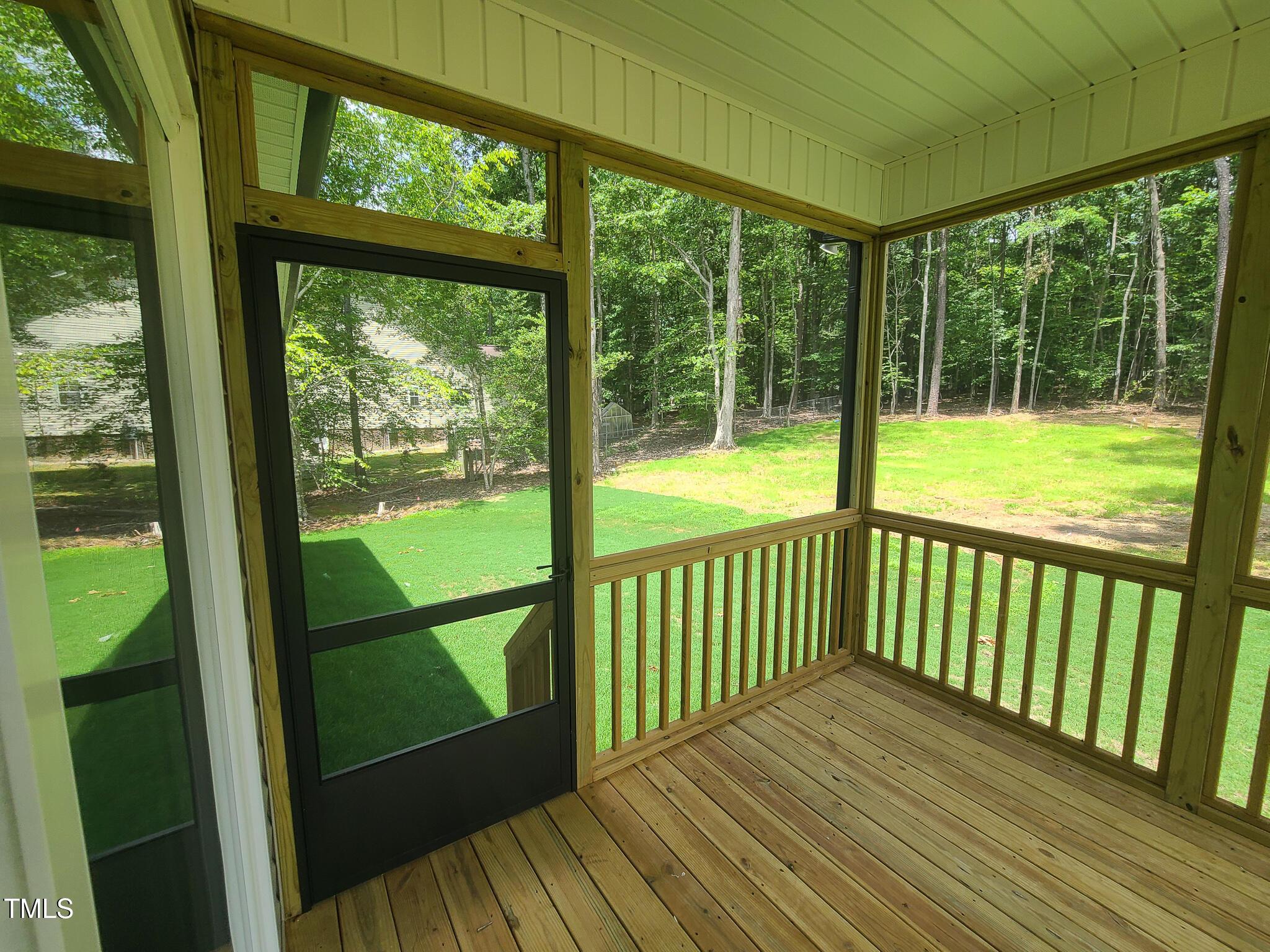 154 Black Cloud Drive Louisburg, NC 27549 - Photo 27 of 28 a view of a balcony with wooden floor