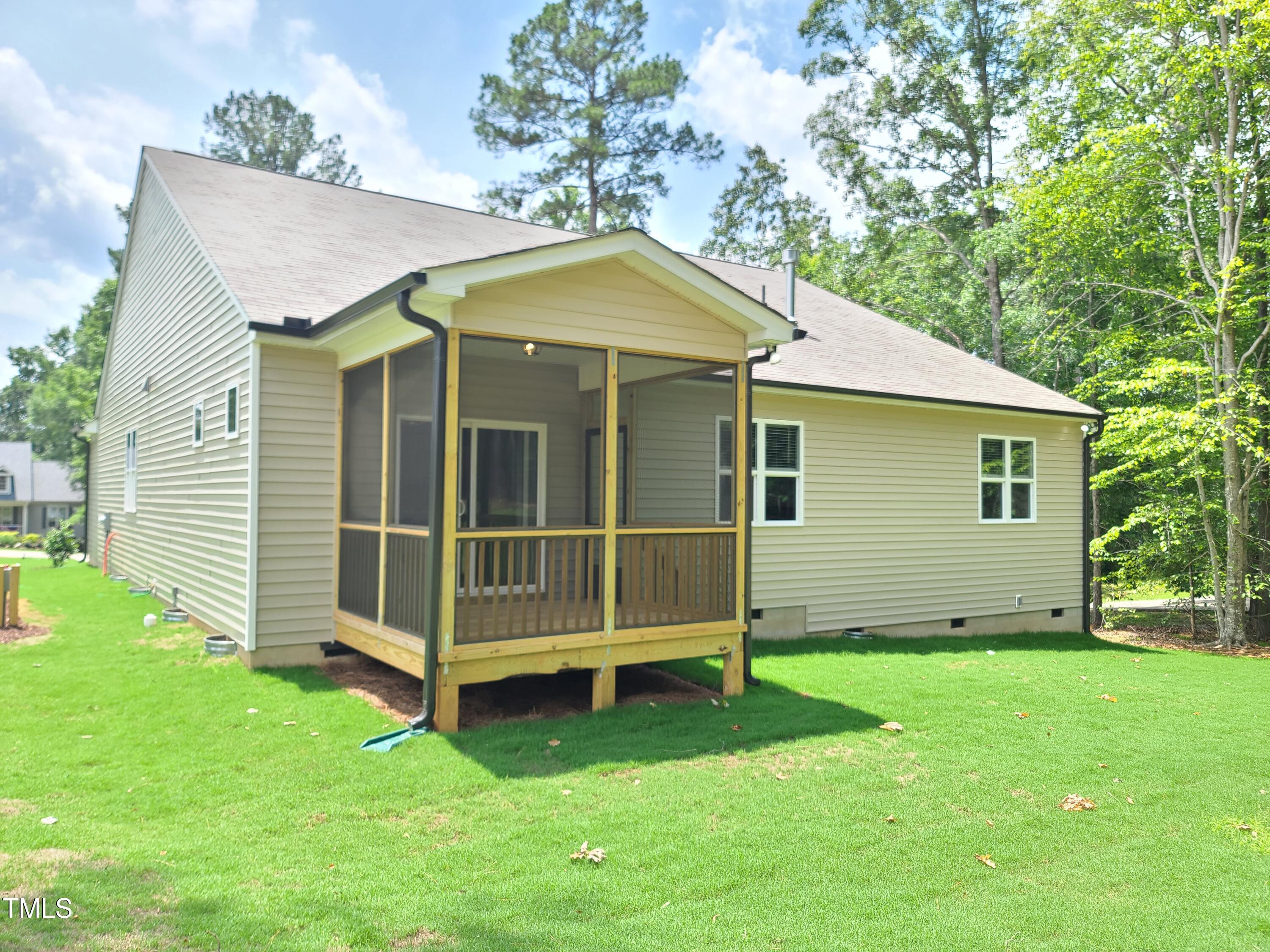 154 Black Cloud Drive Louisburg, NC 27549 - Photo 28 of 28 a view of a house with a yard