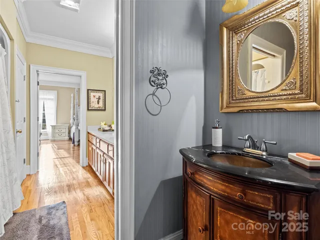 a view of a bathroom sink and a mirror