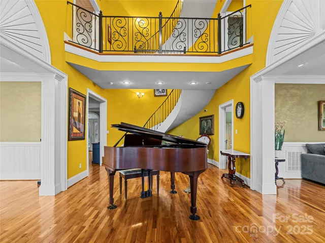 a view of a patio with table and chairs