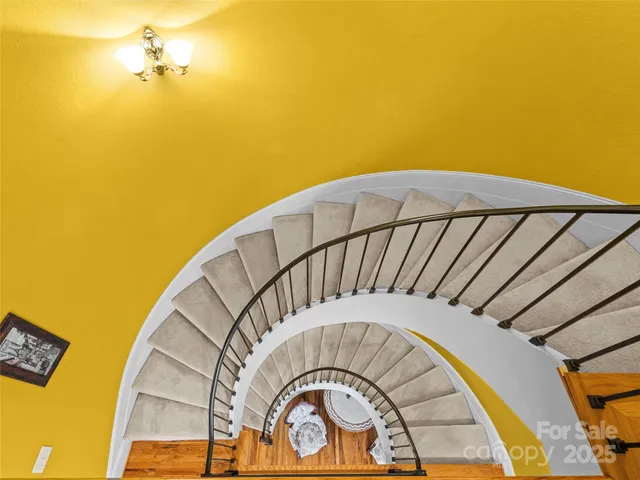 a view of a swimming pool with a house in the background