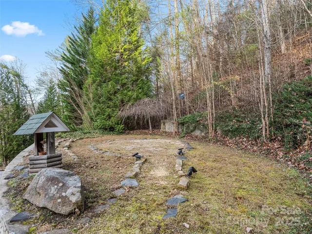 a backyard of a house with lots of green space