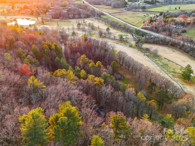 a view of a lake with a yard
