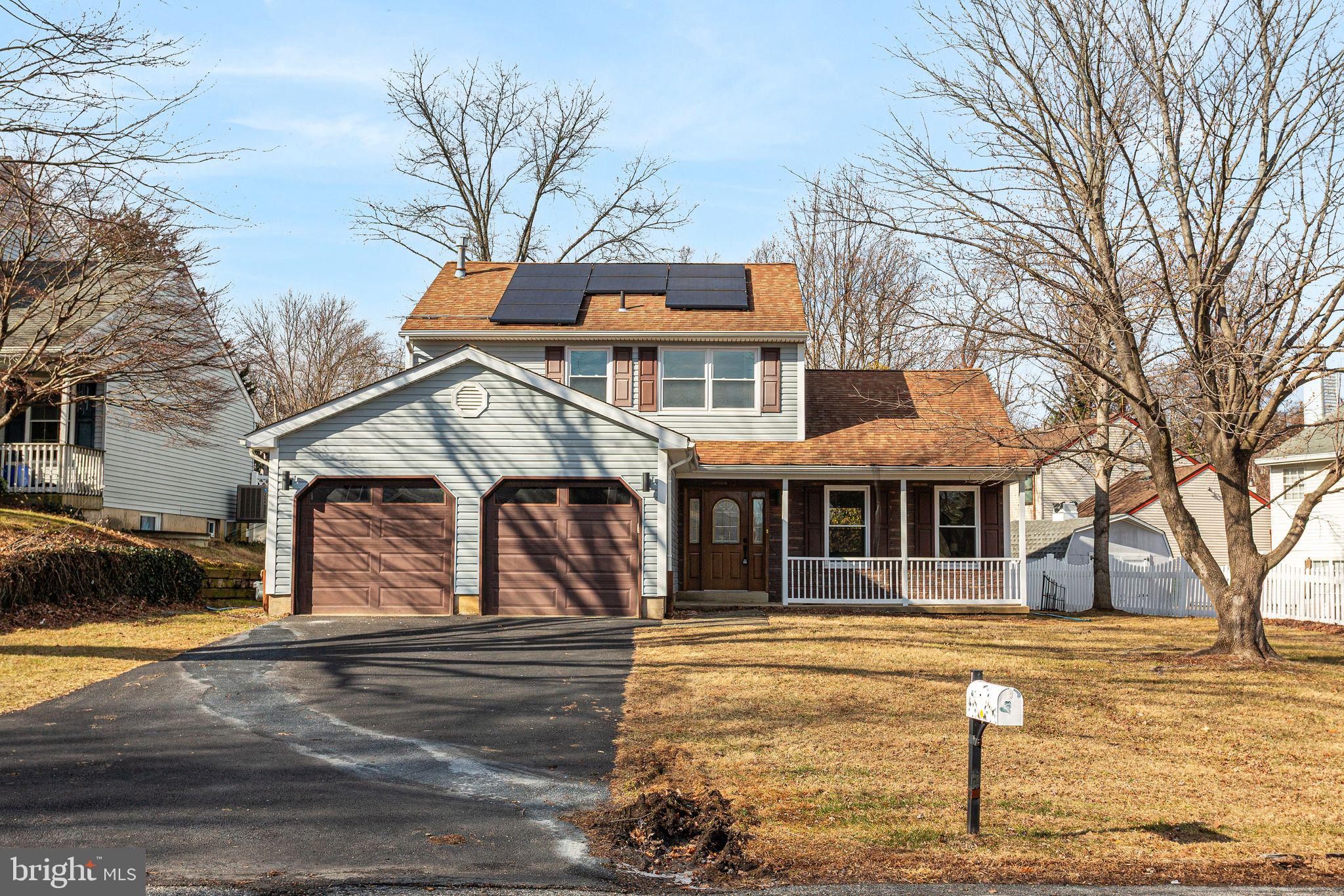 a front view of a house with swimming pool