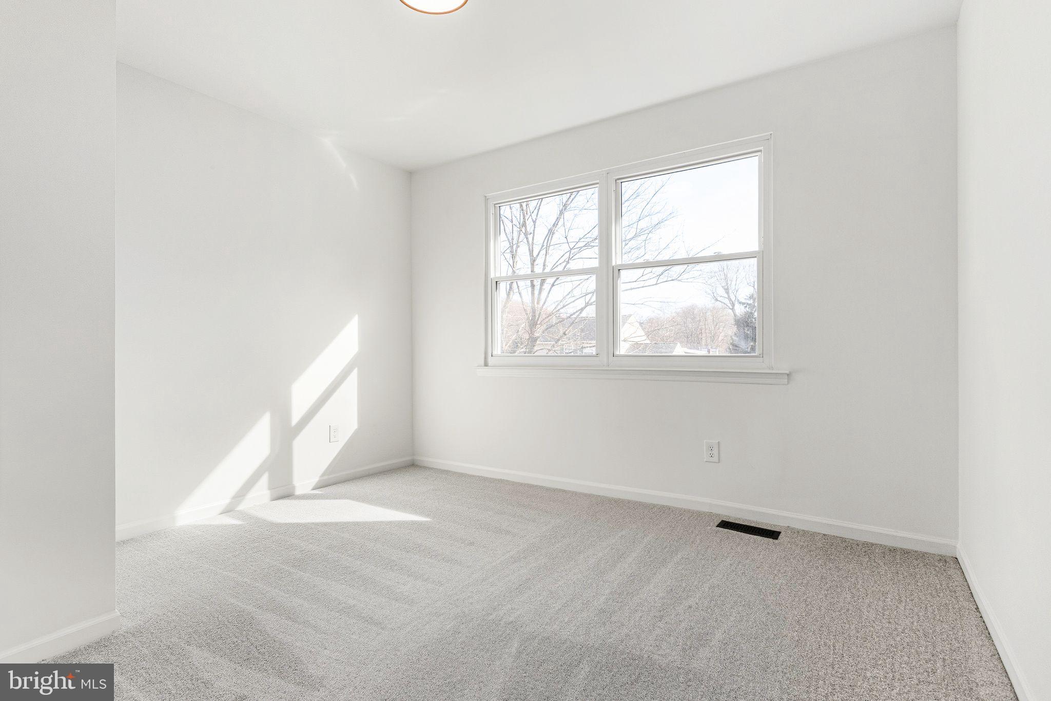 15162 Wayside Road Philadelphia, PA 19116 - Photo 23 of 34 an empty room with a window