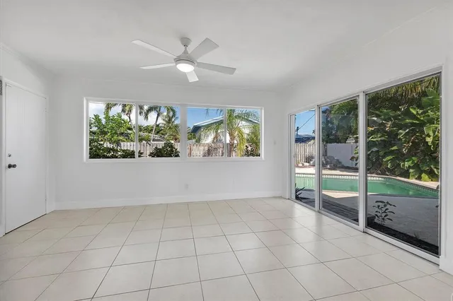 an empty room with floor to ceiling windows and floor to ceiling window