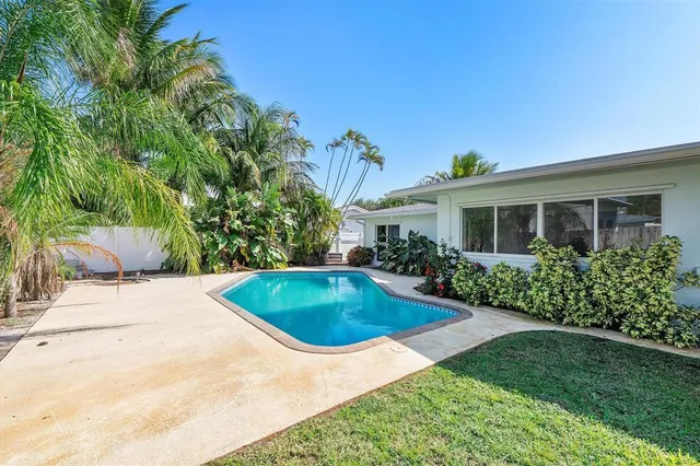 a view of outdoor space yard swimming pool and patio