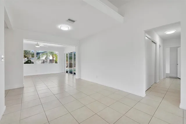 a view of an empty room and window