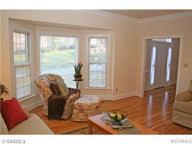 12904 Rockridge Road Chester, VA 23831 - Photo 5 of 12 a living room with furniture and a large window