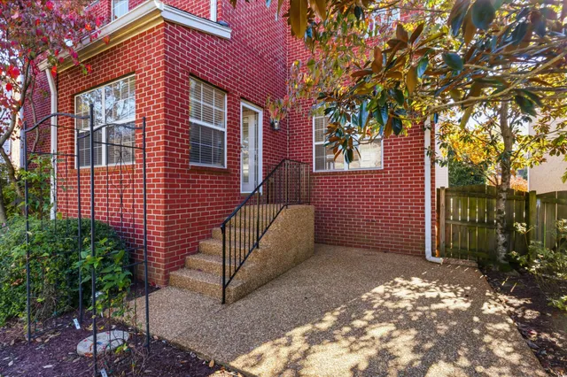 a view of a garden with a tree