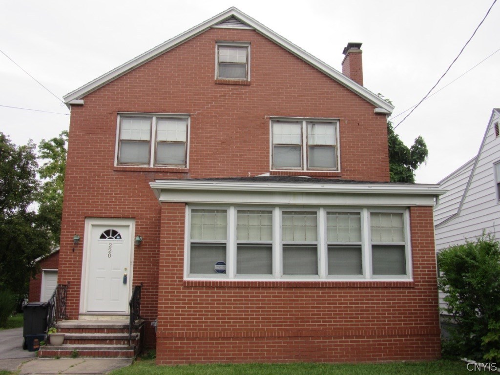 220 Wheaton Road Syracuse, NY 13203 - Photo 1 of 1 Exterior front, brick house with huge and beautifu