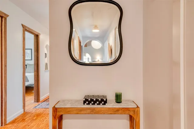 a bathroom with a mirror and a sink