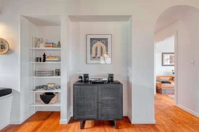 a living room with furniture and decor